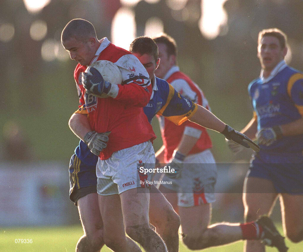 13 January 2002; Keith Lynch of Louth in action against Colm Tooney of Wicklow during the O'Byrne Cup Semi-Final match between Louth and Wicklow at O'Raghallaighs GAA Club in Drogheda, Louth. Photo by Ray McManus/Sportsfile