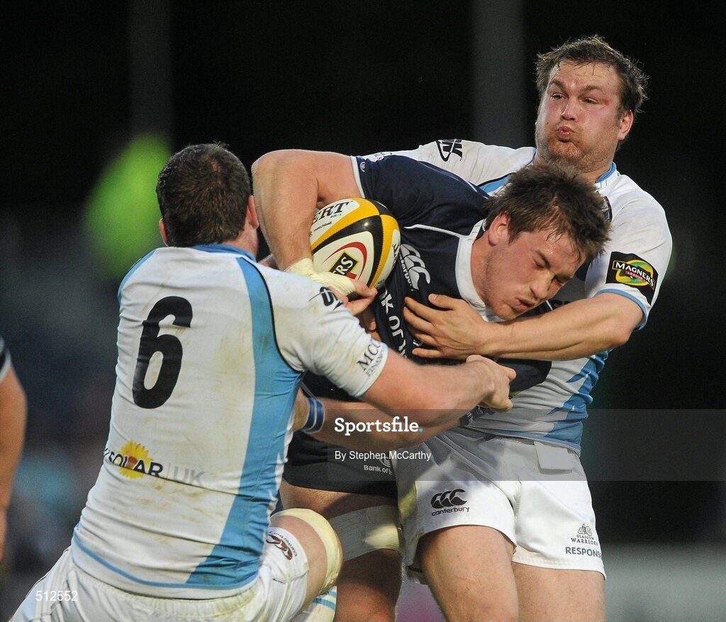 6 May 2011; Dominic Ryan, Leinster, is tackled by Eddie James, left, and Fergus Thomson, Glasgow Warriors. Celtic League, Leinster v Glasgow Warriors, RDS, Ballsbridge, Dublin. Picture credit: Stephen McCarthy / SPORTSFILE