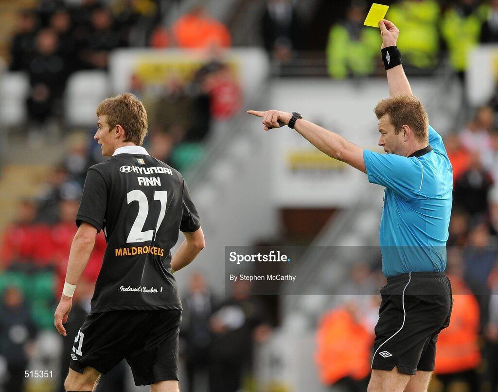 14 May 2011; Referee Alan Kelly issues a yellow card to Ronan Finn, Shamrock Rovers. Setanta Sports Cup Final, Dundalk v Shamrock Rovers, Tallaght Stadium, Tallaght, Co. Dublin. Picture credit: Stephen McCarthy / SPORTSFILE