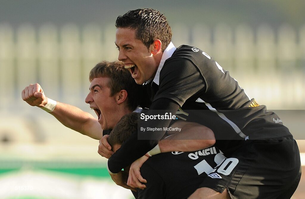 14 May 2011; Gary O'Neill, Shamrock Rovers, hidden, celebrates after scoring his side's first goal with team-mates Ronan Finn and Billy Dennehy, right. Setanta Sports Cup Final, Dundalk v Shamrock Rovers, Tallaght Stadium, Tallaght, Co. Dublin. Picture credit: Stephen McCarthy / SPORTSFILE