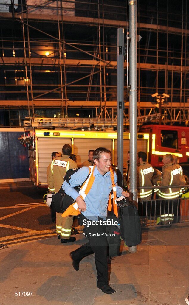 20 May 2011; A hotel employee carries guest's luggage after The Maldron Hotel, St Mary's Street, Cardiff, which was evacuated at 3:30am, Thursday night, after a pipe burst. All guests are safe and no fire was reported. The hotel opened on Monday. Extensive water damage has been caused from floor 3 down. It was anticipated that the hotel would be full of Leinster rugby supporters for the Heineken Cup Final against Northampton Saints on Saturday. Cardiff, Wales. Picture credit: Ray McManus / SPORTSFILE