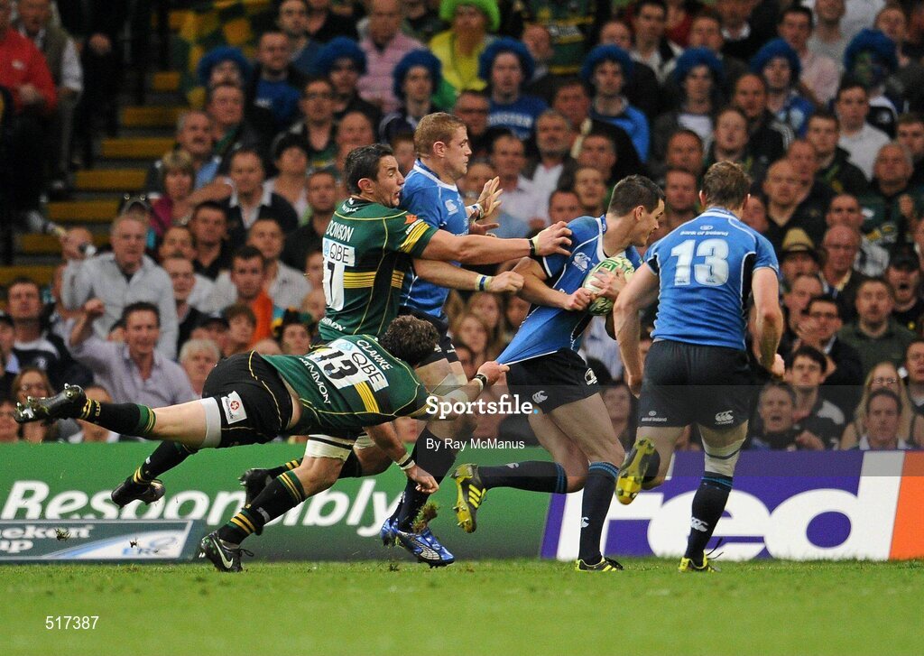 21 May 2011; Jonathan Sexton, Leinster, supported by Jamie Heaslip, left, and Brian O'Driscoll, goes over to score his and his side's second try, despite the tackle of Jon Clarke, 13, and Phil Dowson, Northampton Saints. Heineken Cup Final, Leinster v Northampton Saints, Millennium Stadium, Cardiff, Wales. Picture credit: Ray McManus / SPORTSFILE