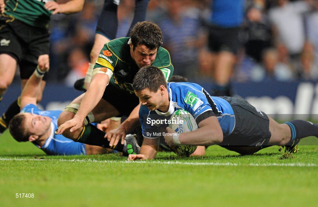 21 May 2011; Jonathan Sexton, Leinster, goes over to score his side's second try despite the tackle of Calum Clark, Northampton Saints. Heineken Cup Final, Leinster v Northampton Saints, Millennium Stadium, Cardiff, Wales. Picture credit: Matt Browne / SPORTSFILE