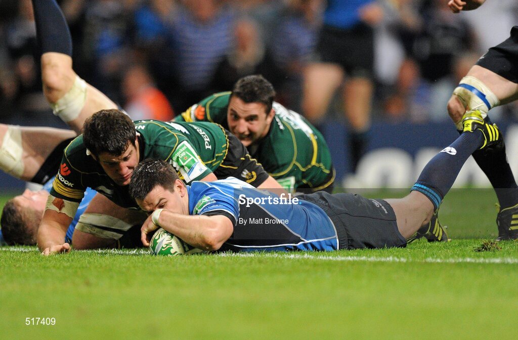 21 May 2011; Jonathan Sexton, Leinster, goes over to score his side's second try despite the tackle of Calum Clark, Northampton Saints. Heineken Cup Final, Leinster v Northampton Saints, Millennium Stadium, Cardiff, Wales. Picture credit: Matt Browne / SPORTSFILE