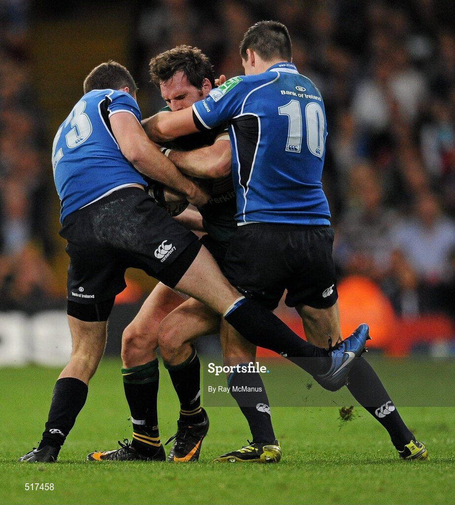 21 May 2011; Jon Clarke, Northampton Saints, is tackled by Fergus McFadden, left, and Jonathan Sexton, Leinster. Heineken Cup Final, Leinster v Northampton Saints, Millennium Stadium, Cardiff, Wales. Picture credit: Ray McManus / SPORTSFILE
