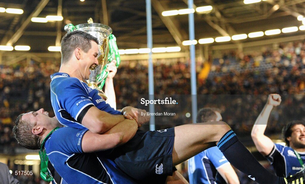 21 May 2011; Leinster's Jonathan Sexton is lifted by team-mate Jamie Heaslip after the game. Heineken Cup Final, Leinster v Northampton Saints, Millennium Stadium, Cardiff, Wales. Picture credit: Brendan Moran / SPORTSFILE