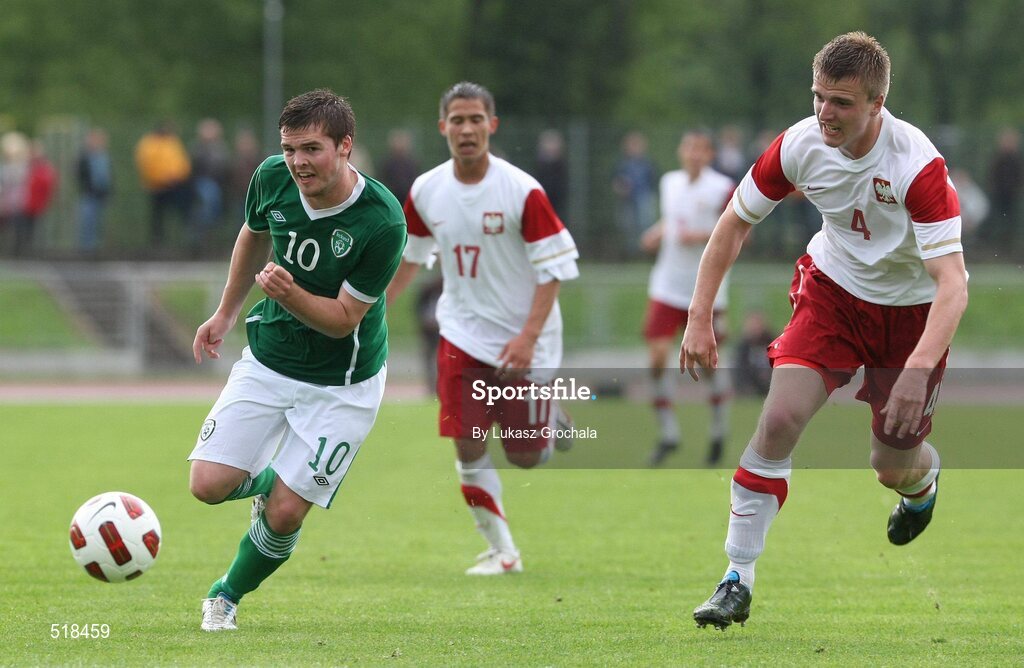 24 May 2011; Connor Murphy, Republic of Ireland, and Mariusz Mikoda, 4, Poland, chase down a loose ball. UEFA Under 19 Championship Elite Round, Republic of Ireland v Poland, Baltyk Koszalin, Koszalin, Poland. Picture credit: Lukasz Grochala / SPORTSFILE