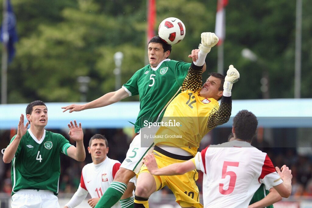24 May 2011; Anthony O'Connor, 5, Republic of Ireland, and Poland's goalkeeper Filip Bednarek contest a dropping ball. UEFA Under 19 Championship Elite Round, Republic of Ireland v Poland, Baltyk Koszalin, Koszalin, Poland. Picture credit: Lukasz Grochala / SPORTSFILE