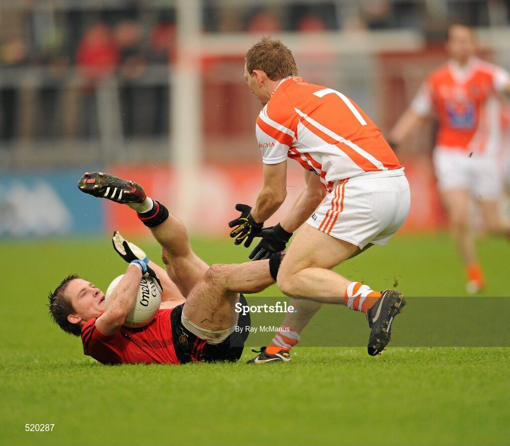 28 May 2011; Paul McComiskey, Down, in action against Paul Duffy, Armagh. Ulster GAA Football Senior Championship Quarter-Final, Armagh v Down, Morgan Athletic Grounds, Armagh. Picture credit: Ray McManus / SPORTSFILE