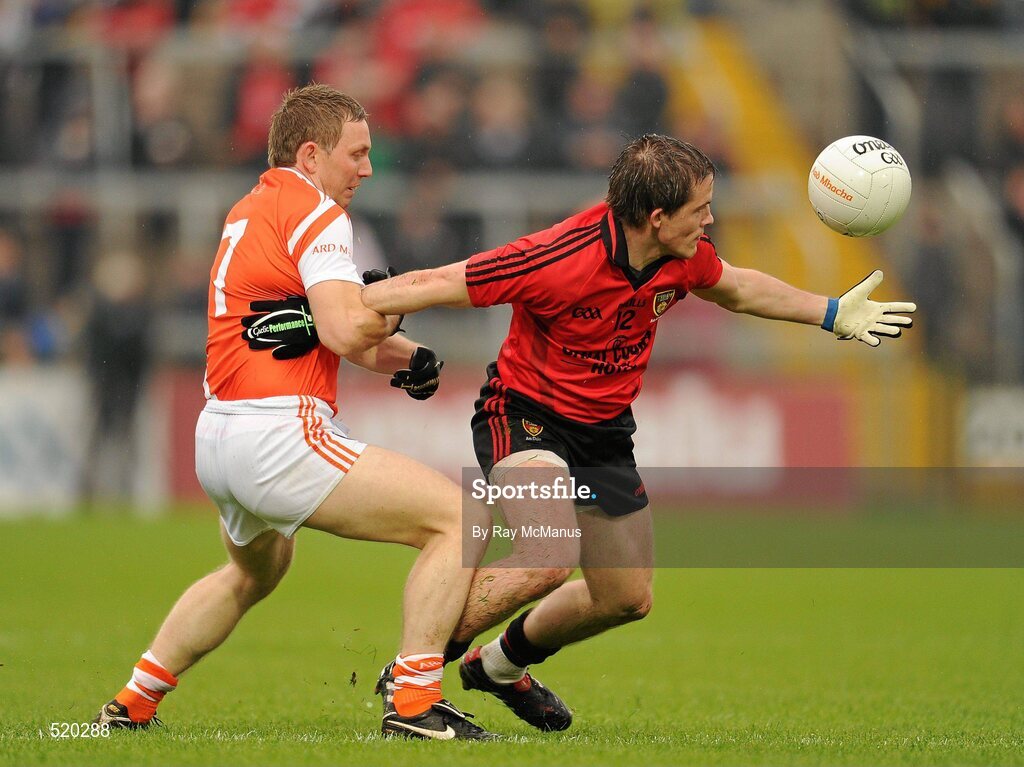 28 May 2011; Paul McComiskey, Down, in action against Paul Duffy, Armagh. Ulster GAA Football Senior Championship Quarter-Final, Armagh v Down, Morgan Athletic Grounds, Armagh. Picture credit: Ray McManus / SPORTSFILE