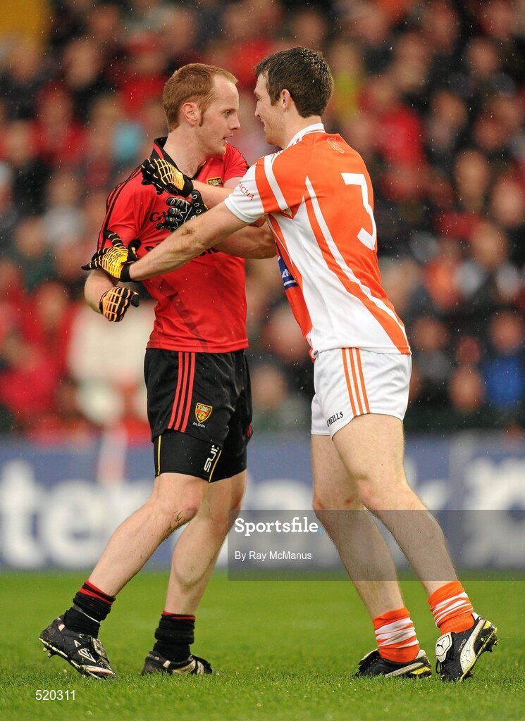 28 May 2011; Brendan Coulter, Down, and Armagh full-back Brendan Donaghy, become involved in a bit of pushing and shoving. Ulster GAA Football Senior Championship Quarter-Final, Armagh v Down, Morgan Athletic Grounds, Armagh. Picture credit: Ray McManus / SPORTSFILE