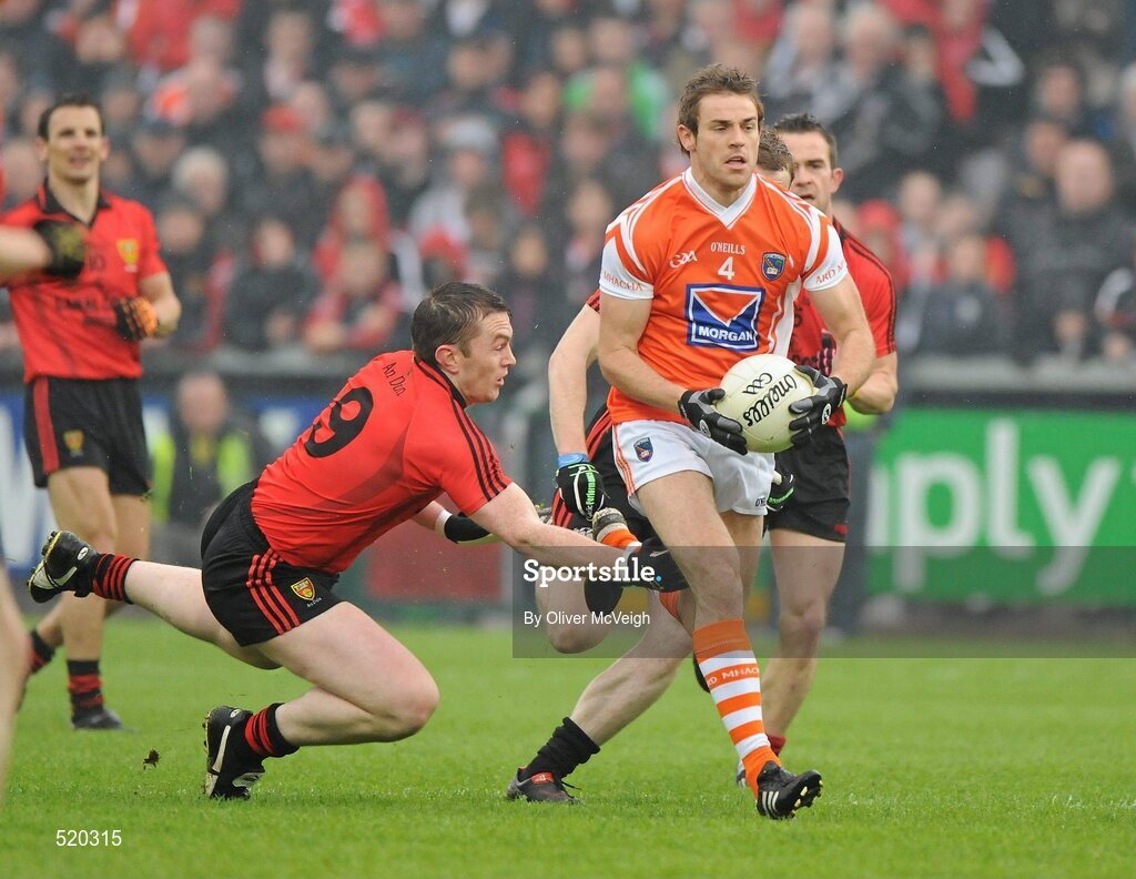 28 May 2011; Kevin Dyas, Armagh, in action against Kalum King, Down. Ulster GAA Football Senior Championship Quarter-Final, Armagh v Down, Morgan Athletic Grounds, Armagh. Picture credit: Oliver McVeigh / SPORTSFILE