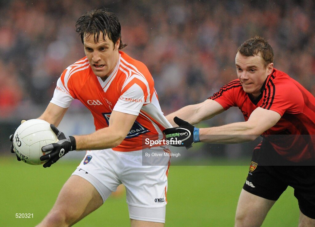 28 May 2011; Billie Joe Padden, Armagh, in action against Dan Rooney, Down. Ulster GAA Football Senior Championship Quarter-Final, Armagh v Down, Morgan Athletic Grounds, Armagh. Picture credit: Oliver McVeigh / SPORTSFILE
