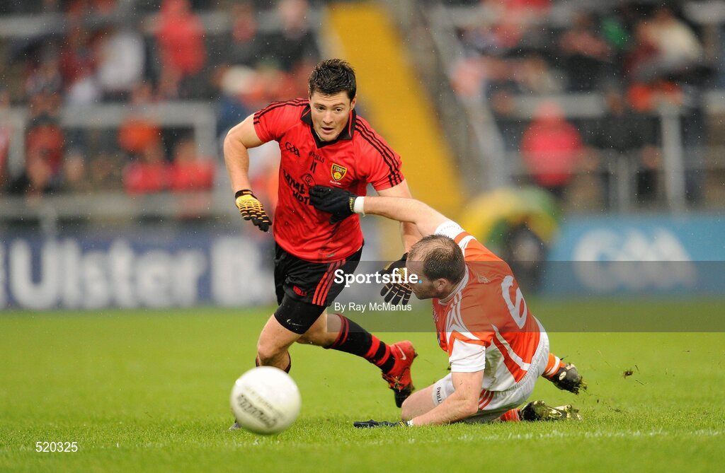 28 May 2011; Martin Clarke, Down, in action against Ciaran McKeever, Armagh. Ulster GAA Football Senior Championship Quarter-Final, Armagh v Down, Morgan Athletic Grounds, Armagh. Picture credit: Ray McManus / SPORTSFILE
