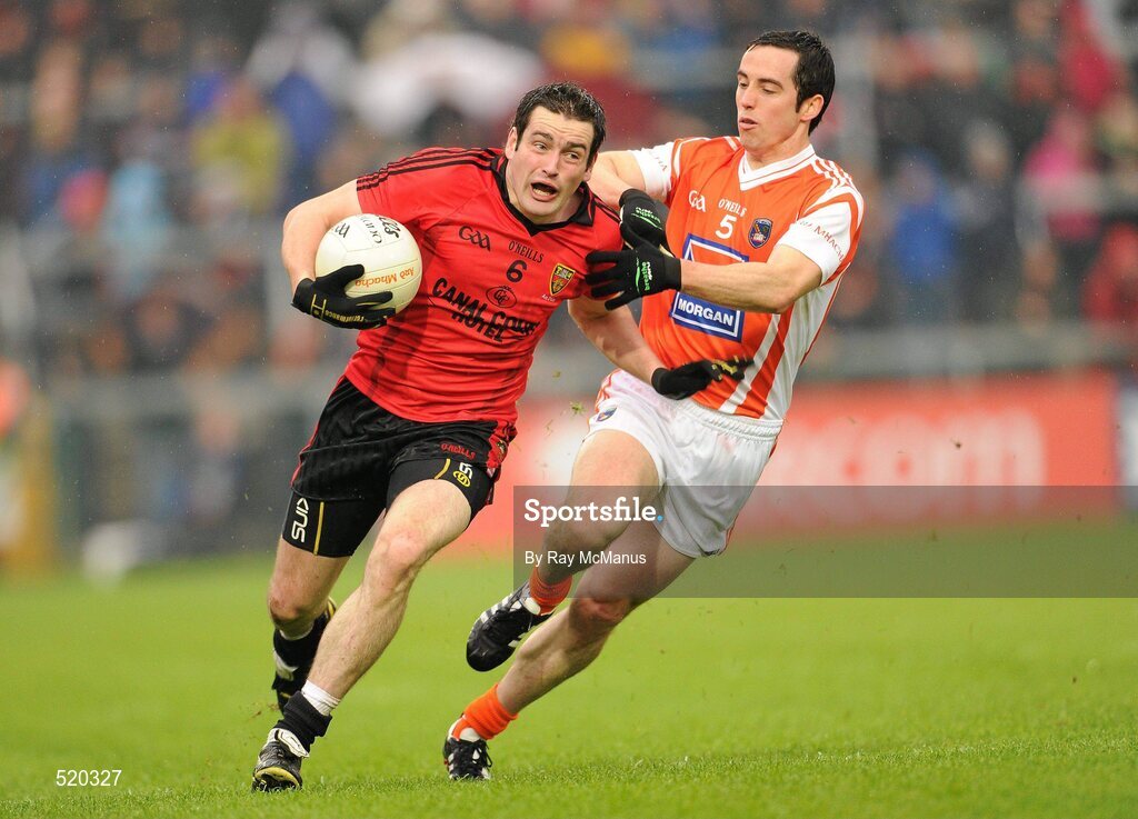 28 May 2011; Kevin McKernan, Down, in action against Aaron Kernan, Armagh. Ulster GAA Football Senior Championship Quarter-Final, Armagh v Down, Morgan Athletic Grounds, Armagh. Picture credit: Ray McManus / SPORTSFILE