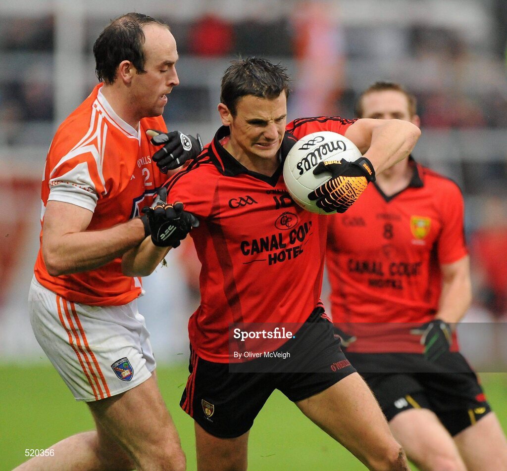 28 May 2011; Daniel Hughes, Down, in action against Malachy Mackin, Armagh. Ulster GAA Football Senior Championship Quarter-Final, Armagh v Down, Morgan Athletic Grounds, Armagh. Picture credit: Oliver McVeigh / SPORTSFILE