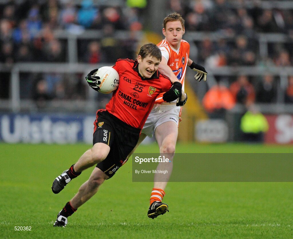 28 May 2011; Conor Maginn, Down, in action against Kieran Toner, Armagh. Ulster GAA Football Senior Championship Quarter-Final, Armagh v Down, Morgan Athletic Grounds, Armagh. Picture credit: Oliver McVeigh / SPORTSFILE