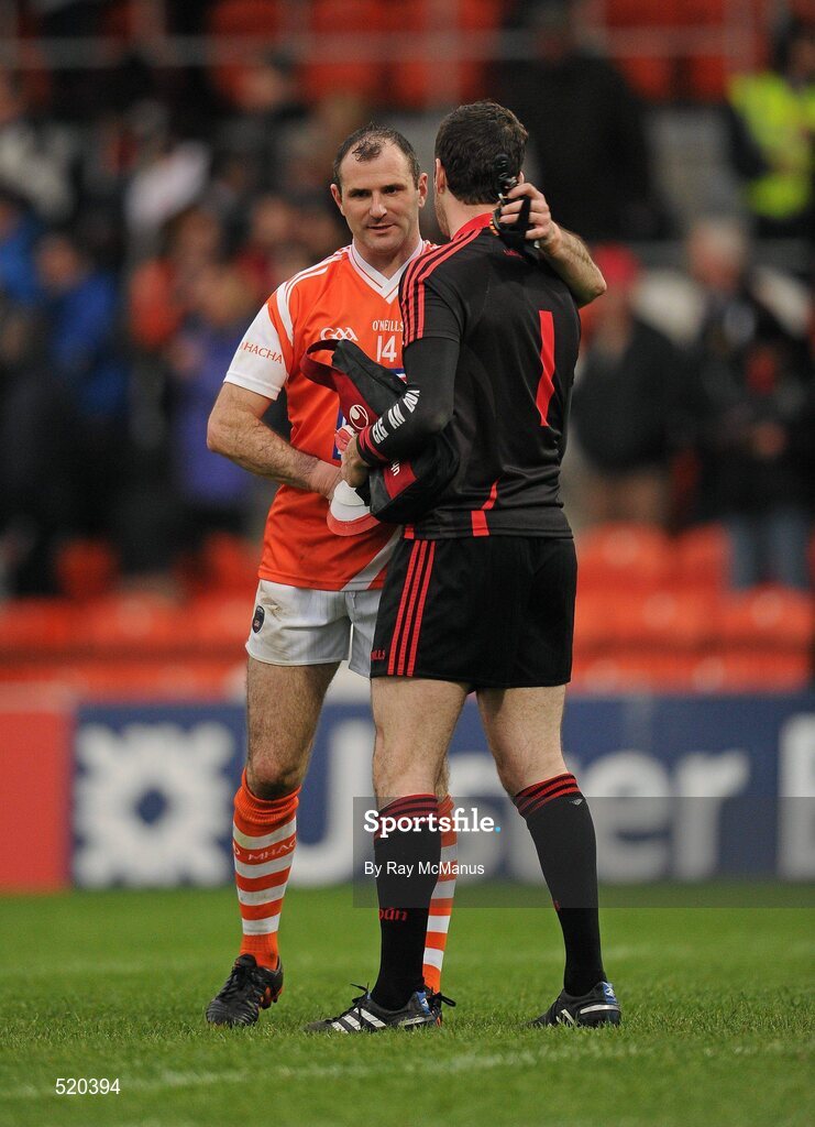 28 May 2011; Armagh captain Steven McDonnell with Down goalkeeper Brendan McVeigh after the game. Ulster GAA Football Senior Championship Quarter-Final, Armagh v Down, Morgan Athletic Grounds, Armagh. Picture credit: Ray McManus / SPORTSFILE