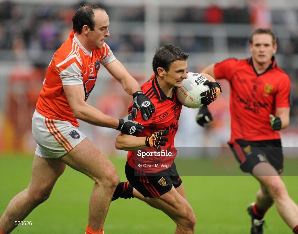 28 May 2011; Daniel Hughes, Down, in action against Malachy Mackin, Armagh. Ulster GAA Football Senior Championship Quarter-Final, Armagh v Down, Morgan Athletic Grounds, Armagh. Picture credit: Oliver McVeigh / SPORTSFILE