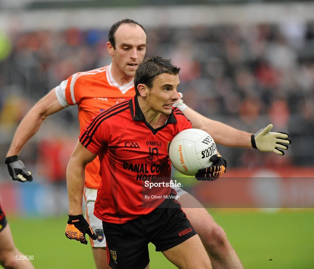 28 May 2011; Daniel Hughes, Down, in action against Malachy Mackin, Armagh. Ulster GAA Football Senior Championship Quarter-Final, Armagh v Down, Morgan Athletic Grounds, Armagh. Picture credit: Oliver McVeigh / SPORTSFILE