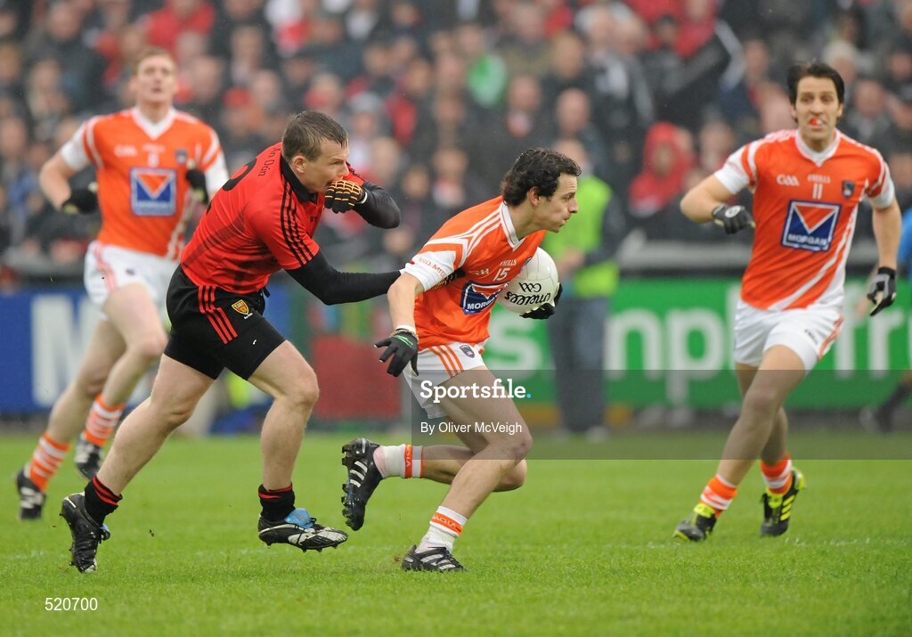 28 May 2011; Jamie Clarke, Armagh, in action against Daniel McCartan, Down. Ulster GAA Football Senior Championship Quarter-Final, Armagh v Down, Morgan Athletic Grounds, Armagh. Picture credit: Oliver McVeigh / SPORTSFILE