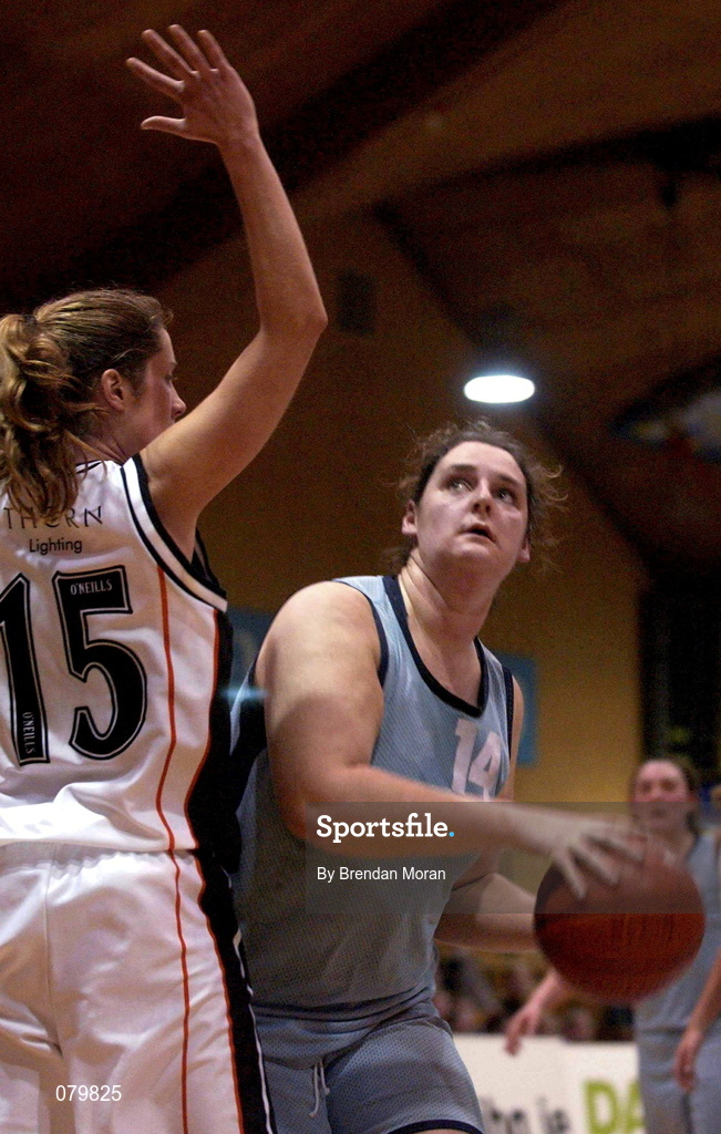 25 January 2002; Eleanor Curren of Mercy Coolock in action against Gillian Ennis of Dart Killester during the ESB Women's National Cup semi-final between Mercy Coolock and Dart Killester at the ESB Arena in Tallaght, Dublin. Photo by Brendan Moran/Sportsfile