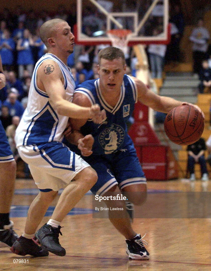 25 January 2002; Mike Keohane of Waterford Crystal in action against Scott Summersgill of SX3 Star during the ESB Men's National Cup semi-final between Waterford Crystal and SX3 Star at the ESB Arena in Tallaght, Dublin. Photo by Brian Lawless/Sportsfile