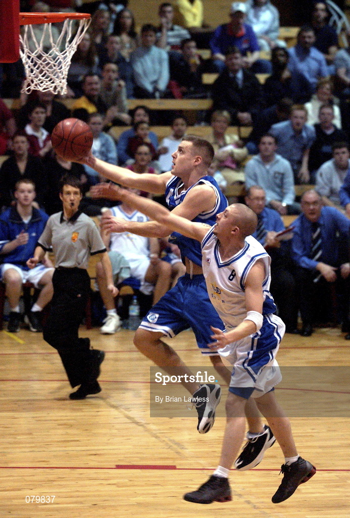25 January 2002; Mike Keohane of Waterford Crystal in action against Scott Summersgill of SX3 Star during the ESB Men's National Cup semi-final between Waterford Crystal and SX3 Star at the ESB Arena in Tallaght, Dublin. Photo by Brian Lawless/Sportsfile