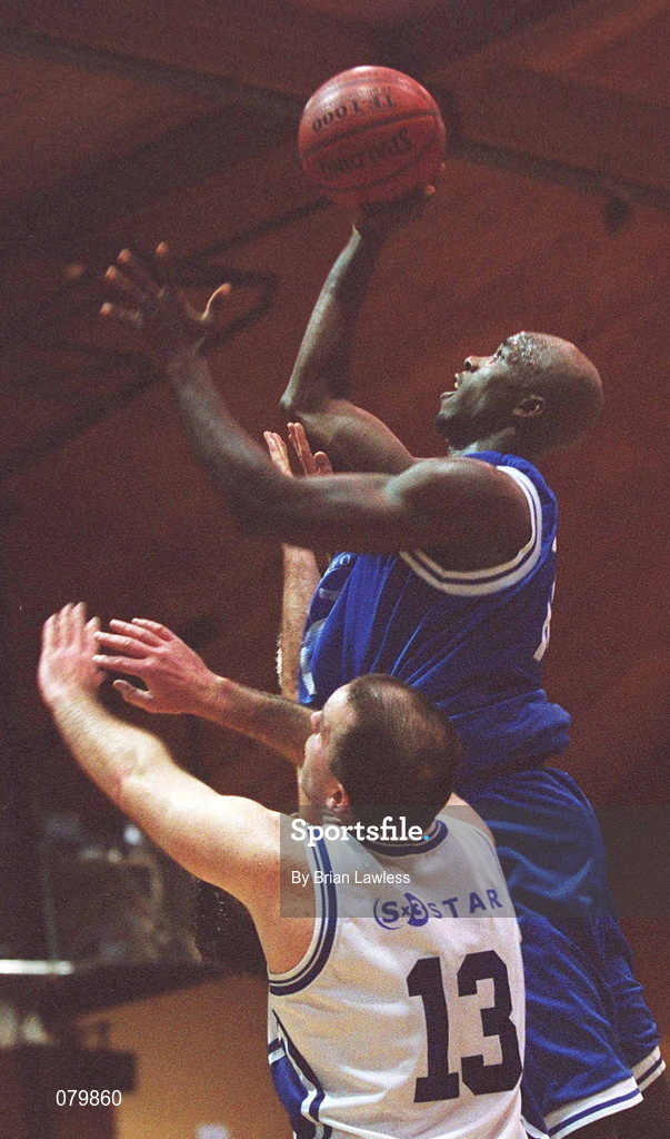 25 January 2002; James Singleton of Waterford Crystal goes up for a basket despite the attentions of John Leahy of SX3 during the ESB Men's National Cup semi-final between Waterford Crystal and SX3 Star at the ESB Arena in Tallaght, Dublin. Photo by Brian Lawless/Sportsfile