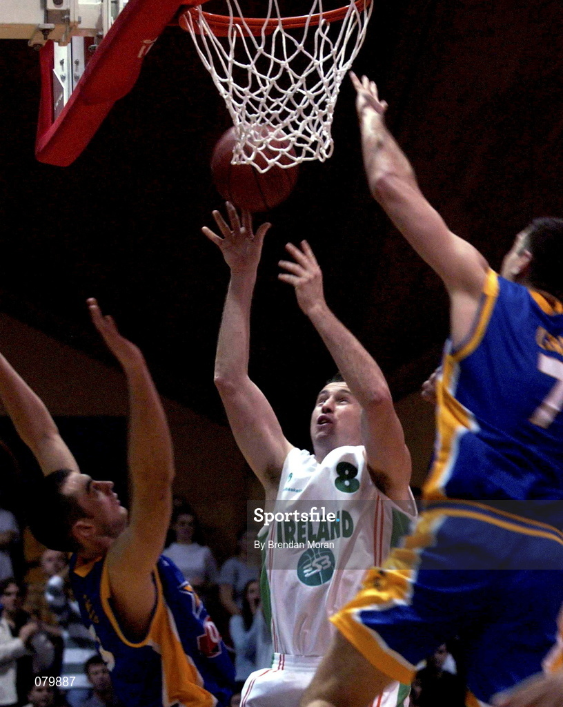 26 January 2002; Marty Conlon of Ireland shoots a basket despite the attentions of Bosnia's Jasmin Hukic, left, and Samir Leric during the European Championship semi-final match between Ireland and Bosnia at the ESB Arena in Tallaght, Dublin. Photo by Brendan Moran/Sportsfile
