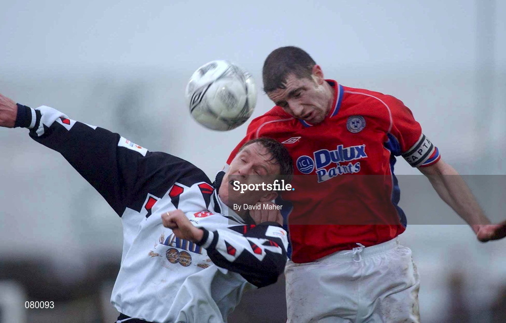 27 January 2002; Martin O'Reilly of Dundalk in action against Pat Fenlon of Shelbourne during the eircom League Premier Division match between Dundalk and Shelbourne at Oriel Park in Dundalk. Photo by David Maher/Sportsfile