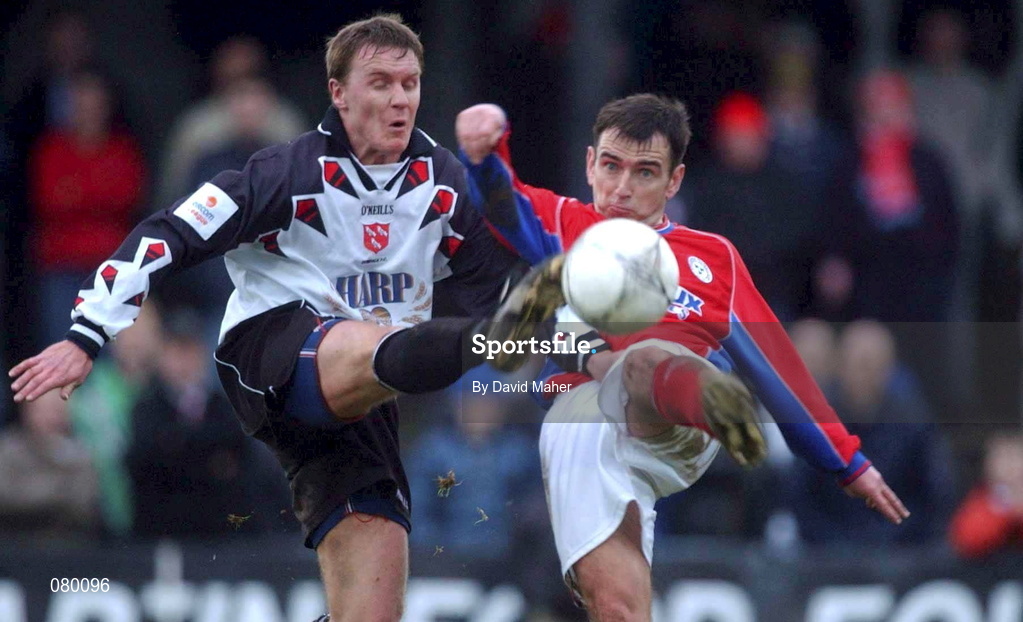 27 January 2002; Martin O'Reilly of Dundalk in action against Pat Fenlon of Shelbourne during the eircom League Premier Division match between Dundalk and Shelbourne at Oriel Park in Dundalk. Photo by David Maher/Sportsfile