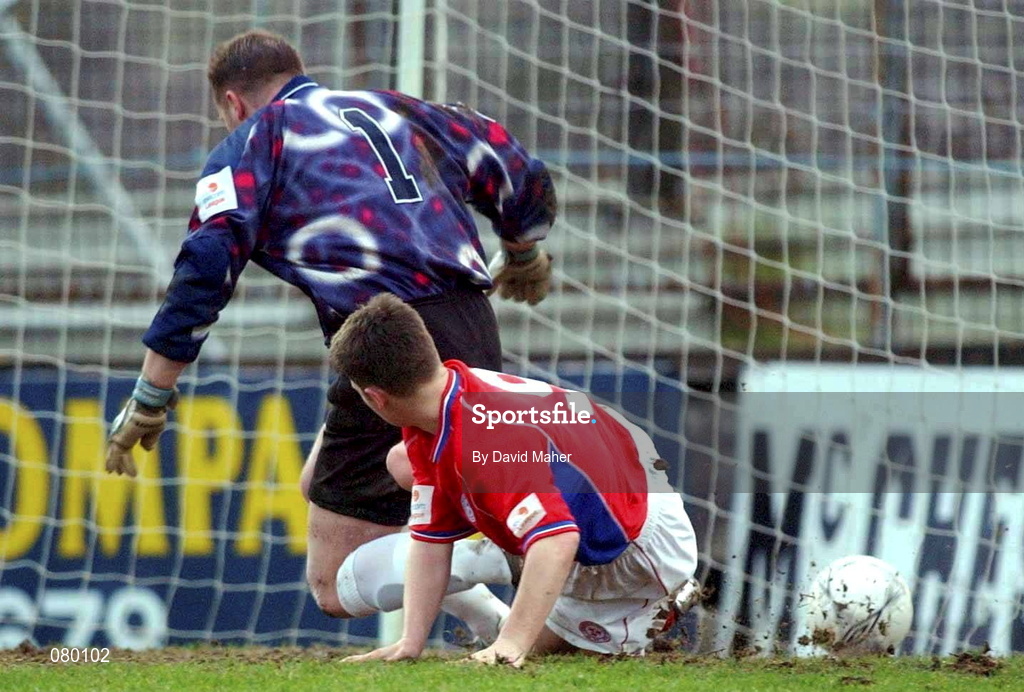 27 January 2002; Wesley Houlihan of Shelbourne beats Dundalk goalkeeper John Connolly to score his sides second goal during the eircom League Premier Division match between Dundalk and Shelbourne at Oriel Park in Dundalk. Photo by David Maher/Sportsfile