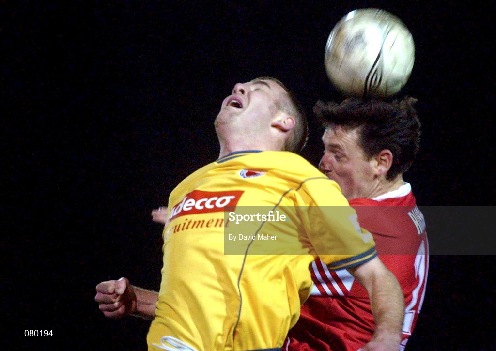 29 January 2002; Stephen Caffrey of Bohemians in action against Martin Russell of St Patricks Athletics during the Eircom League Cup quarter final match between St Patrick's Athletic and Bohemians at Richmond Park in Dublin. Photo by David Maher/Sportsfile