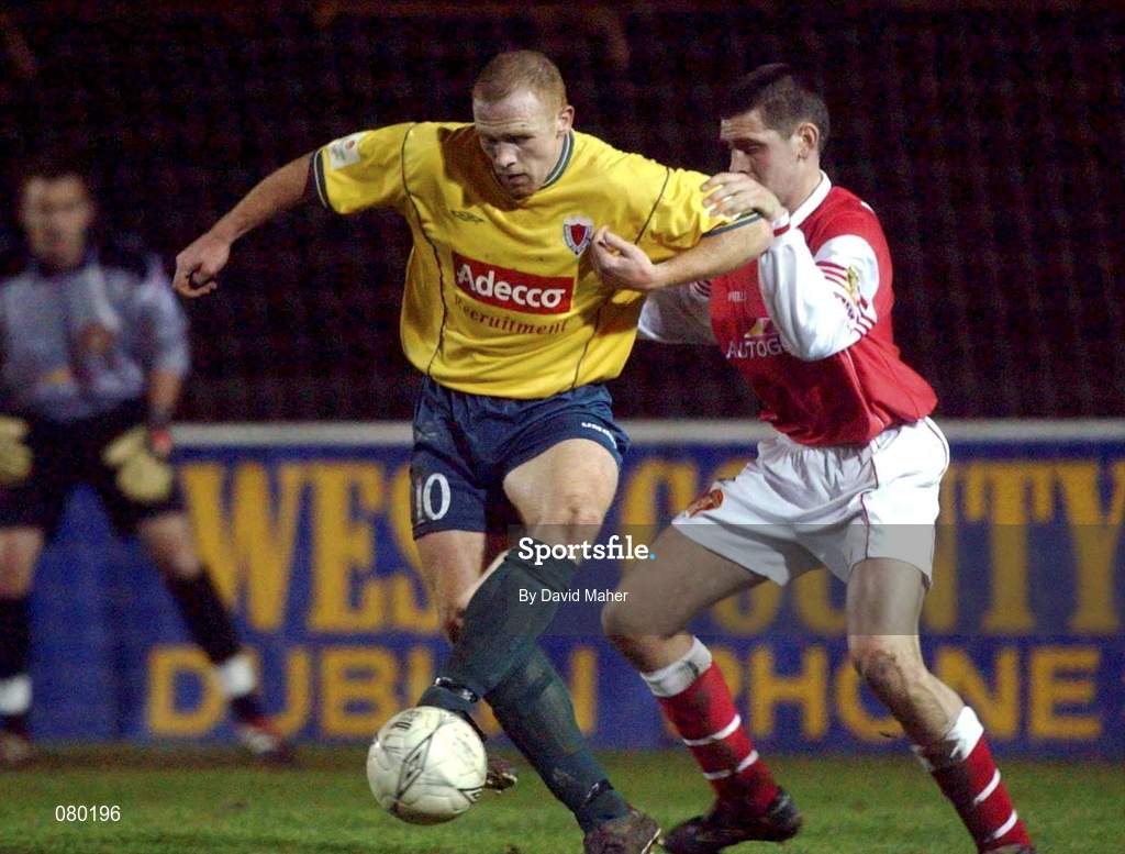 29 January 2002; Glen Crowe of Bohemians in action against Darragh Maguire of St Patrick's Athletic during the Eircom League Cup quarter final match between St Patrick's Athletic and Bohemians at Richmond Park in Dublin. Photo by David Maher/Sportsfile