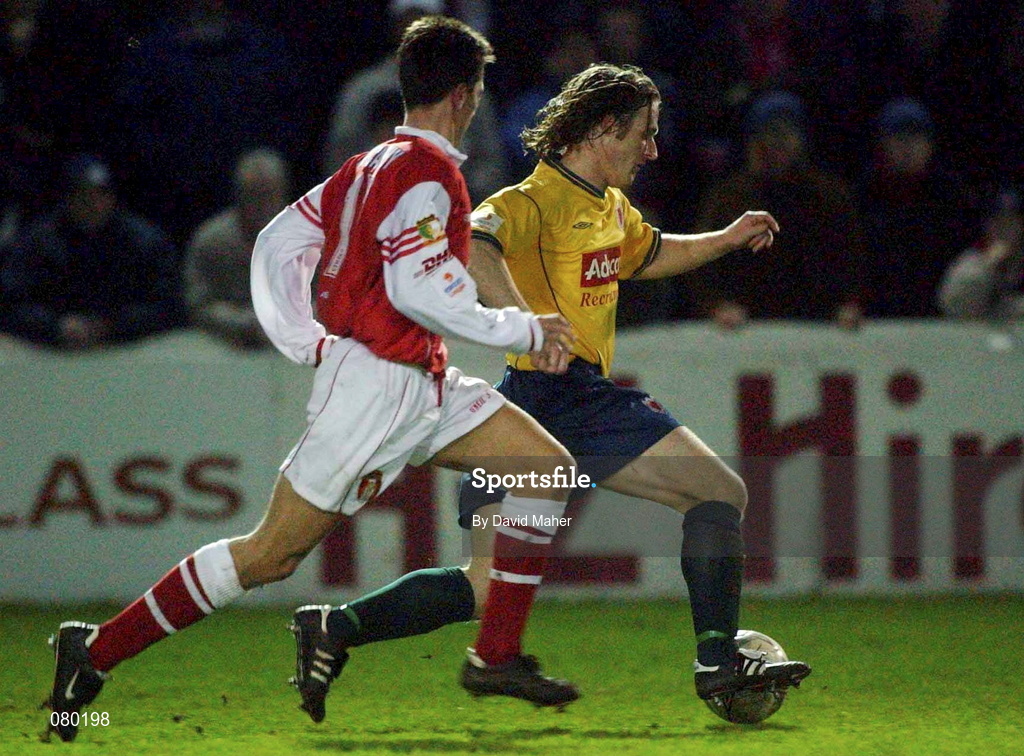 29 January 2002; Simon Webb of Bohemians in action against Ger McCarthy of St Patrick's Athletic during the Eircom League Cup quarter final match between St Patrick's Athletic and Bohemians at Richmond Park in Dublin. Photo by David Maher/Sportsfile