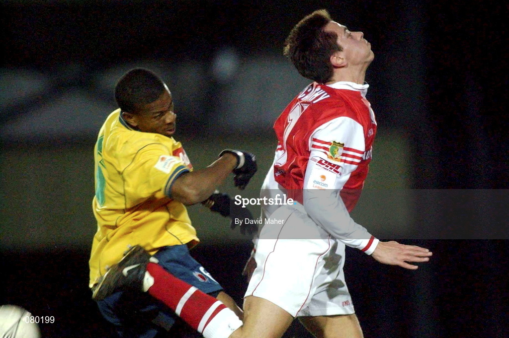 29 January 2002; Avery John of Bohemians in action against Ger McCarthy of St Patrick's Athletic during the Eircom League Cup quarter final match between St Patrick's Athletic and Bohemians at Richmond Park in Dublin. Photo by David Maher/Sportsfile
