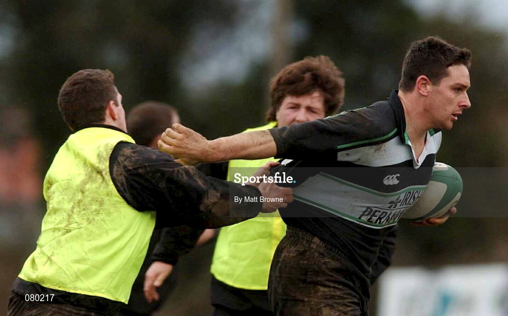 30 January 2002; David Wallace goes past the tackle of Guy Easterby during Irish Rugby Squad Training at Dr Hickey Park in Greystones, Wicklow. Photo by Matt Browne/Sportsfile