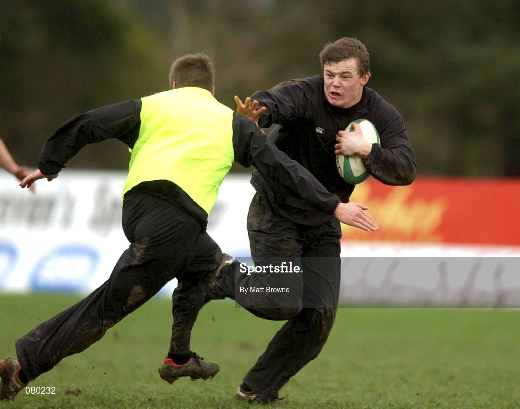30 January 2002; Brian O'Driscoll goes past the tackle of Ronan O'Gara during Irish Rugby Squad Training at Dr Hickey Park in Greystones, Wicklow. Photo by Matt Browne/Sportsfile