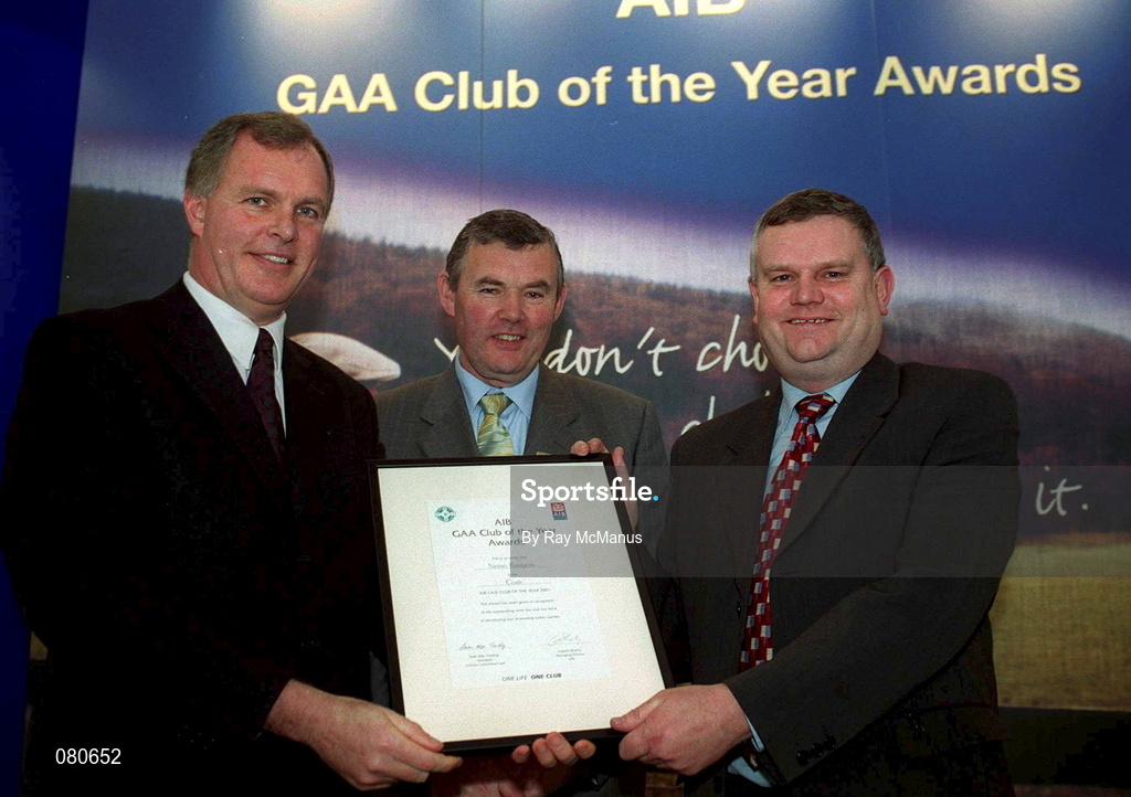 4 February 2002; Pictured at the AIB GAA Club of the Year Awards 2001 in Croke Park are Eugene Sheehy, Managing Director AIB, President of the GAA Sean McCague, Leonard Buckley of Nemo Rangers who won the Cork Club of the Year Award at Croke Park in Dublin. Photo by Ray McManus/Sportsfile