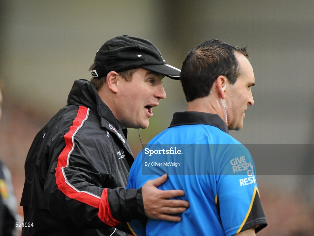 28 May 2011; Down manager James McCartan talking to standby referee David Coldrick about a decison. Ulster GAA Football Senior Championship Quarter-Final, Armagh v Down, Morgan Athletic Grounds, Armagh. Picture credit: Oliver McVeigh / SPORTSFILE