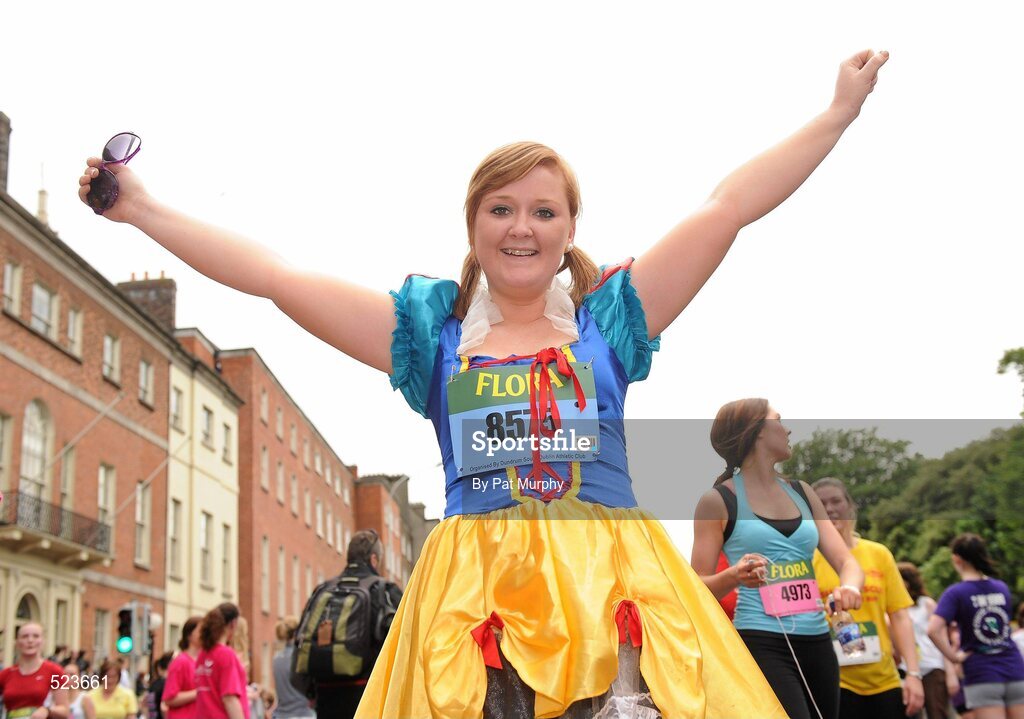 6 June 2011; Olivia McGloat, from Sligo, who ran in aid of the North West Hospice, celebrates after finishing the 2011 Flora Womens Mini Marathon. 2011 Flora Womens Mini Marathon, Dublin City. Picture credit: Pat Murphy / SPORTSFILE