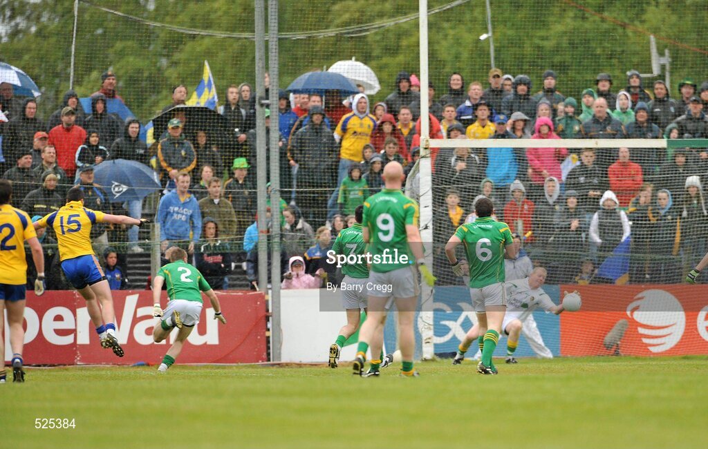 12 June 2011; Donie Shine, far left, Roscommon, puts the ball past Leitrim goalkeeper Cathal McCrann to score his side's first goal. Connacht GAA Football Senior Championship Semi-Final, Leitrim v Roscommon, Páirc Seán Mac Diarmada, Carrick-on-Shannon, Co. Leitrim. Picture credit: Barry Cregg / SPORTSFILE