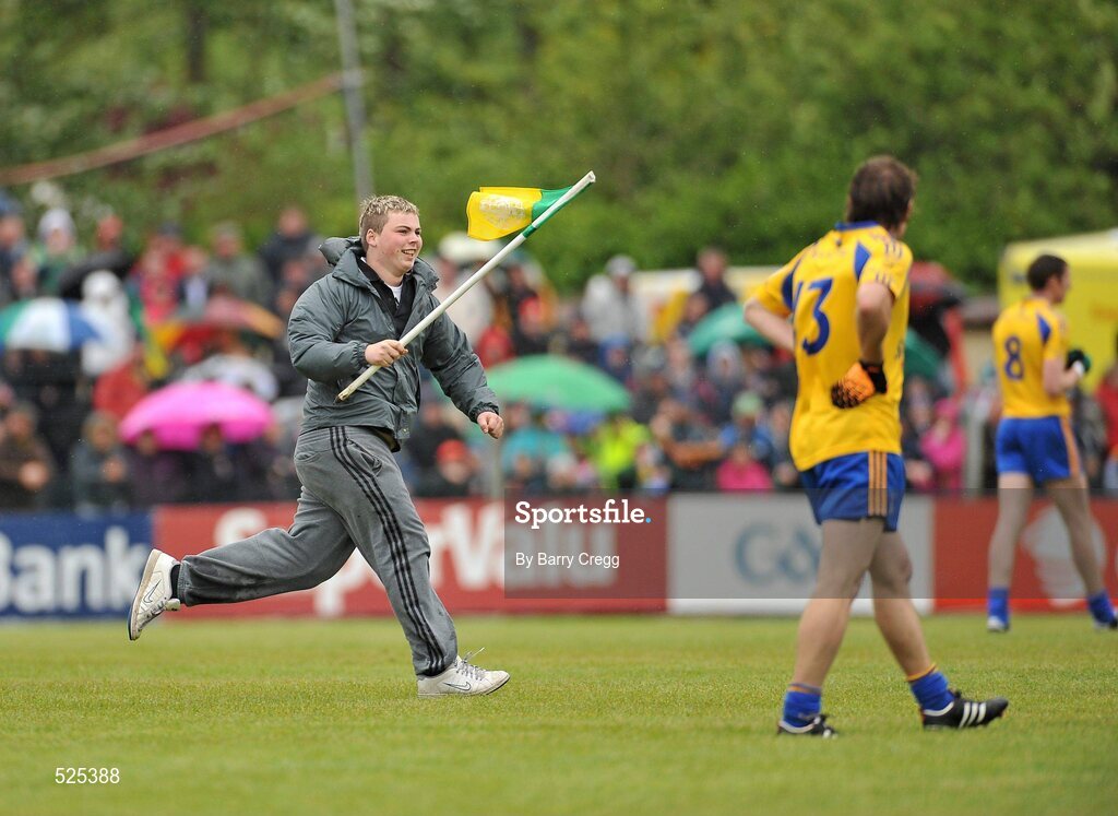 12 June 2011; A general view of a supporter running on to the pitch during the game. Connacht GAA Football Senior Championship Semi-Final, Leitrim v Roscommon, Páirc Seán Mac Diarmada, Carrick-on-Shannon, Co. Leitrim. Picture credit: Barry Cregg / SPORTSFILE