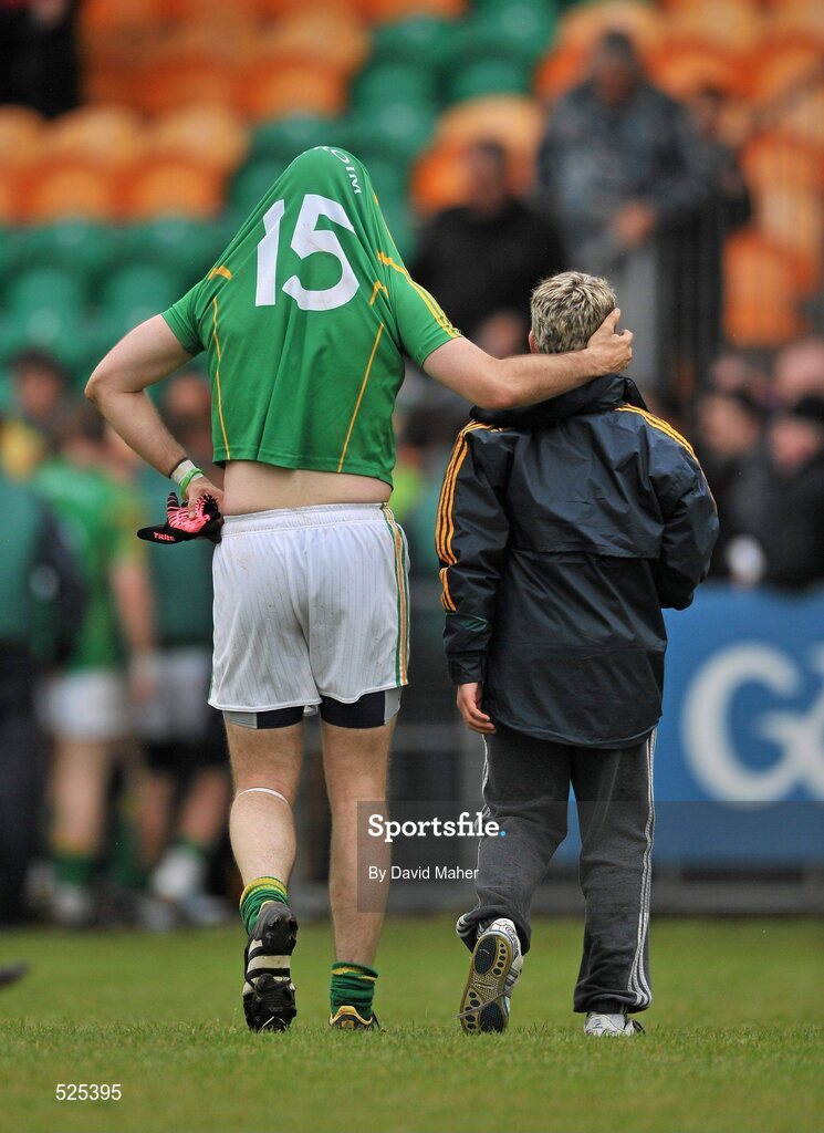 12 June 2011; A dejected James Glancy, Leitrim, with a supporter at the end of the game. Connacht GAA Football Senior Championship Semi-Final, Leitrim v Roscommon, Páirc Seán Mac Diarmada, Carrick-on-Shannon, Co. Leitrim. Picture credit: David Maher / SPORTSFILE