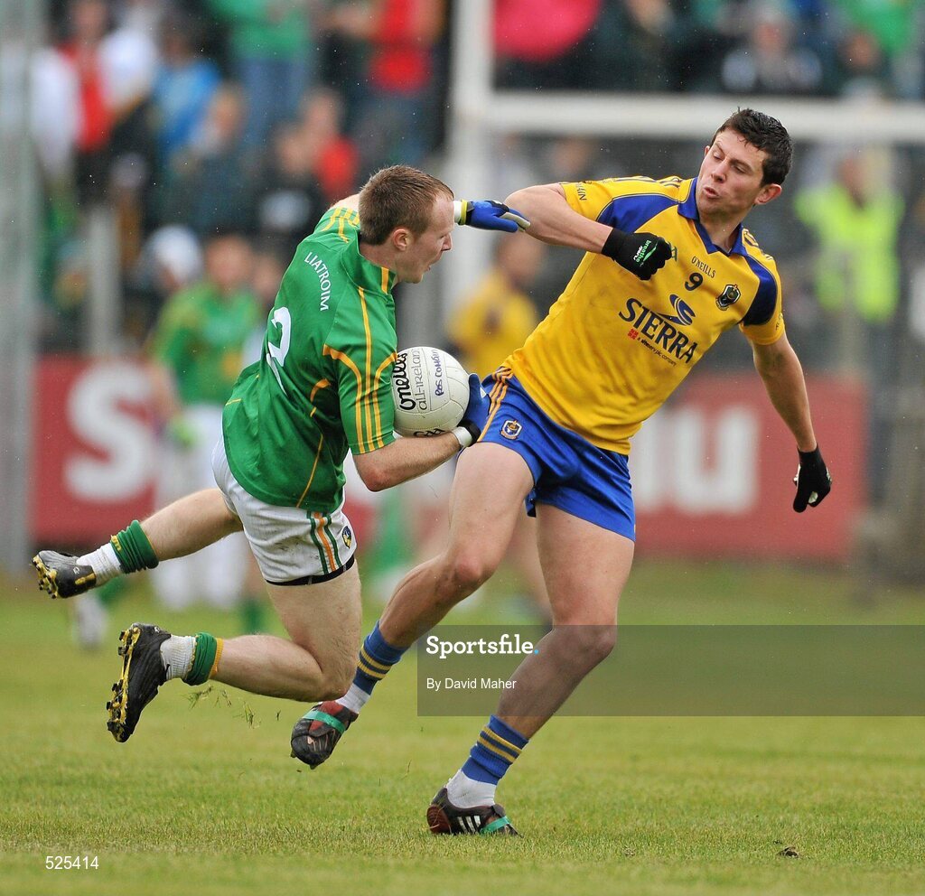 12 June 2011; Karol Mannion, Roscommon, in action against Dermot Reynolds, Leitrim. Connacht GAA Football Senior Championship Semi-Final, Leitrim v Roscommon, Páirc Seán Mac Diarmada, Carrick-on-Shannon, Co. Leitrim. Picture credit: David Maher / SPORTSFILE
