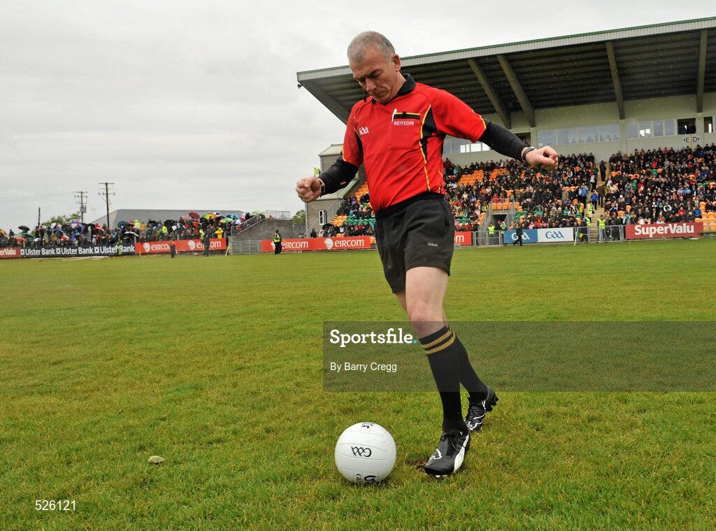 12 June 2011; Referee Pat McEnaney shows off his ball skills after coming out on to the pitch before the start of the game. Connacht GAA Football Senior Championship Semi-Final, Leitrim v Roscommon, Páirc Seán Mac Diarmada, Carrick-on-Shannon, Co. Leitrim. Picture credit: Barry Cregg / SPORTSFILE