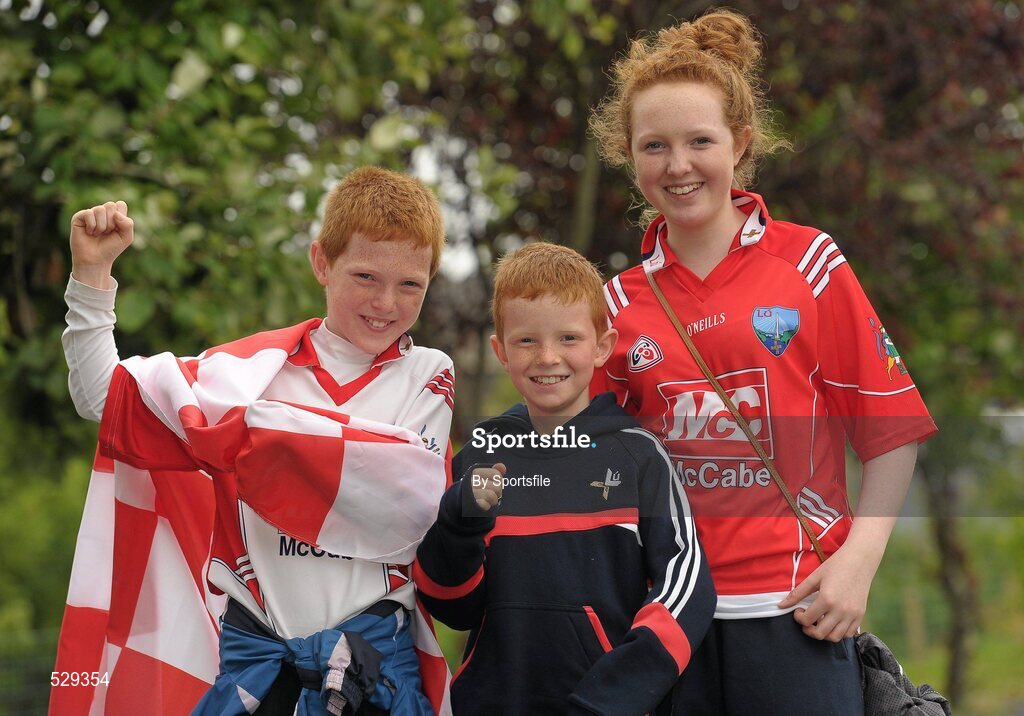 25 June 2011; Louth fans, Donal McKenny, left, age 10, Orla McKenny, age 14, and Paraic McKenny, age 9, from Ardee, Co. Louth, at the game. GAA Football All-Ireland Senior Championship Qualifier Round 1, Louth v Meath, Kingspan Breffni Park, Co. Cavan. Photo by Sportsfile