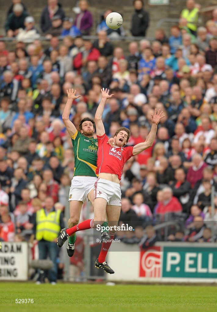 25 June 2011; Brian Donnelly, Louth, in action against Brian Meade, Meath. GAA Football All-Ireland Senior Championship Qualifier Round 1, Louth v Meath, Kingspan Breffni Park, Co. Cavan. Photo by Sportsfile