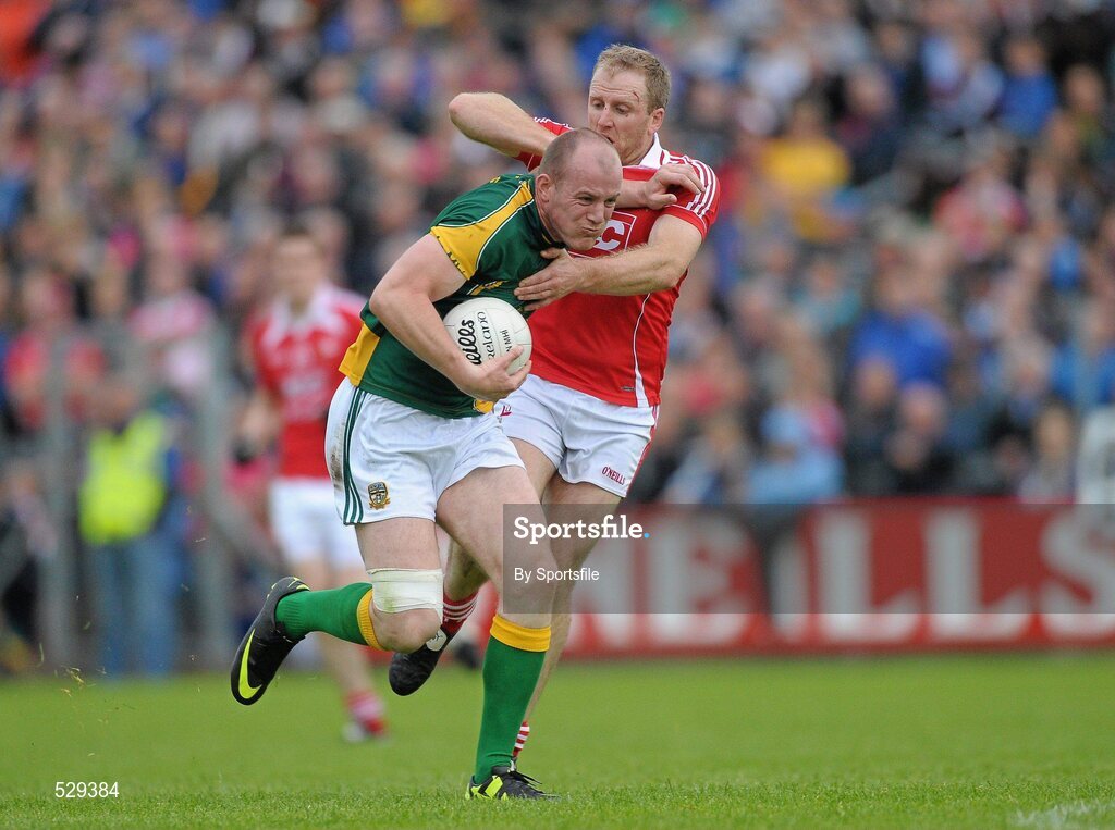 25 June 2011; Joe Sheridan, Meath, in action against Aaron Hoey, Louth. GAA Football All-Ireland Senior Championship Qualifier Round 1, Louth v Meath, Kingspan Breffni Park, Co. Cavan. Photo by Sportsfile